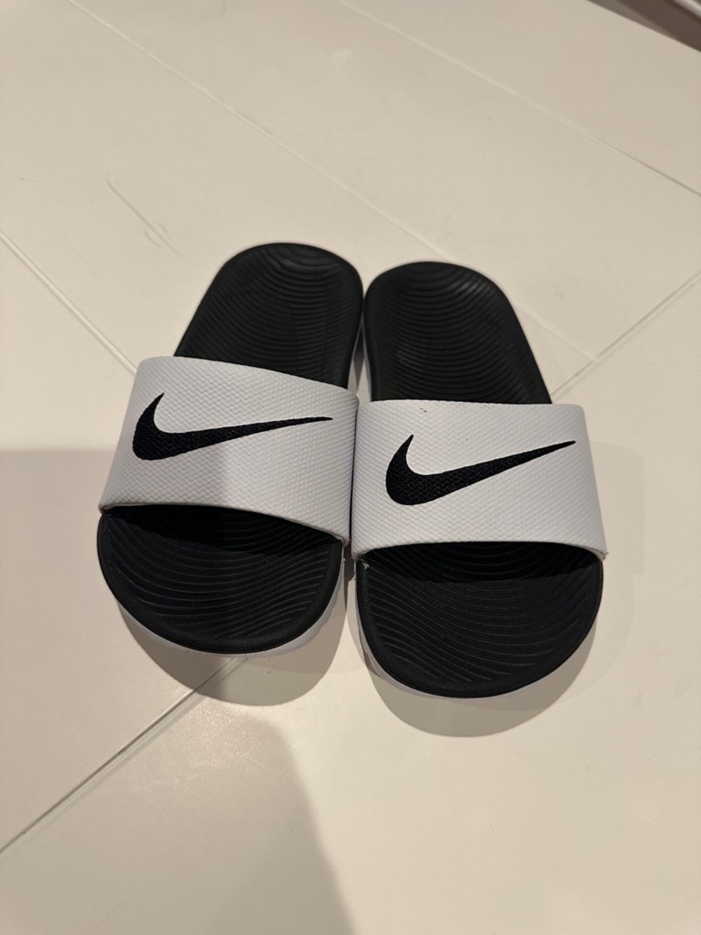Nike Black Footbed White Strap Slide Sandals with Black Swoosh